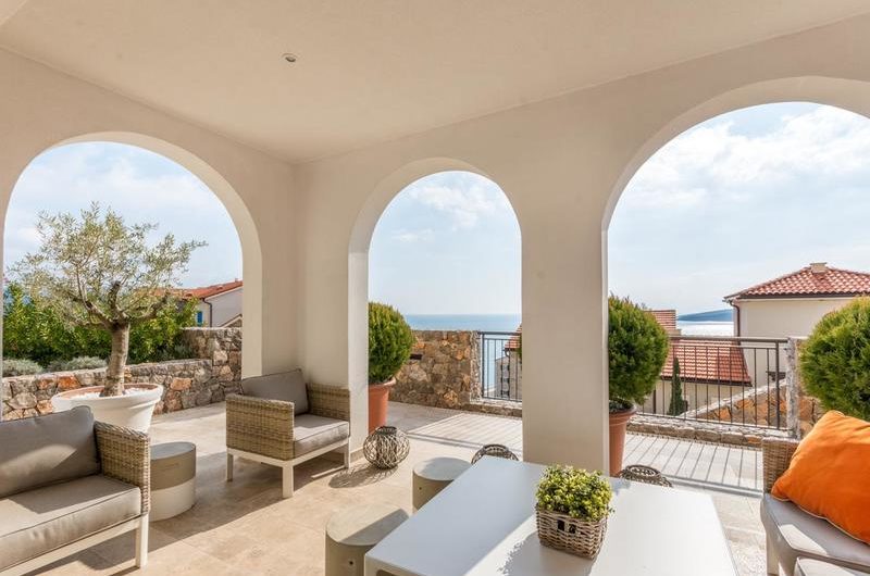 Lustica Bay. Apartment with a 40-meter terrace and sea views