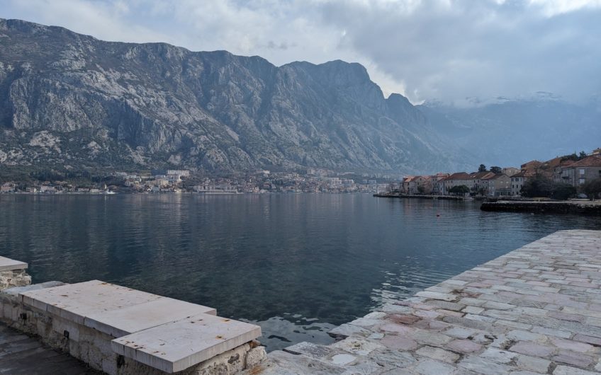 Ancient stone villa on the first line with a pier