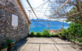 Plot of 1,938 m2 in Boka Kotorska with ancient stone buildings