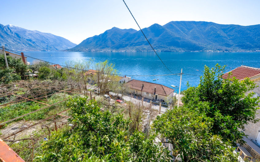 Plot of 1,938 m2 in Boka Kotorska with ancient stone buildings