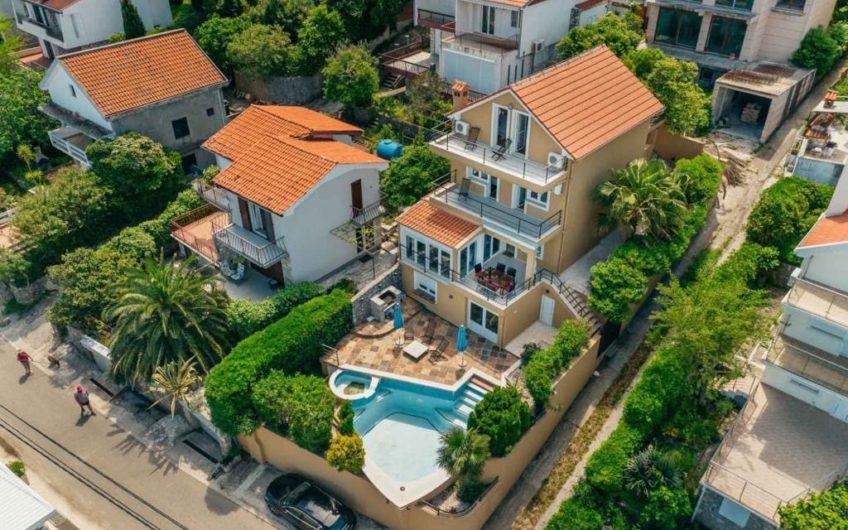 House with a pool in Luštica — 2nd row to the sea!
