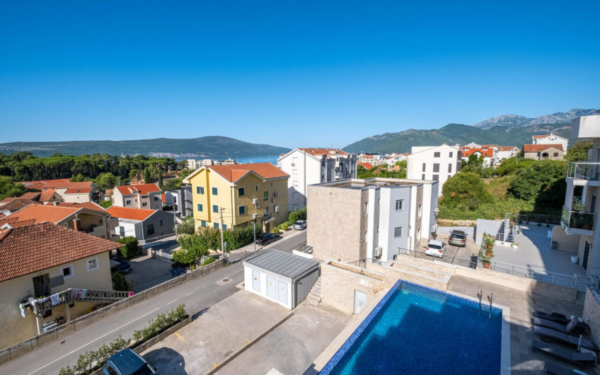 Two-bedroom apartment with panoramic sea views and a large terrace in Tivat