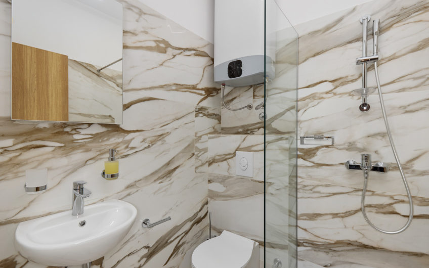 Three-bedroom apartment for sale in Dobrota