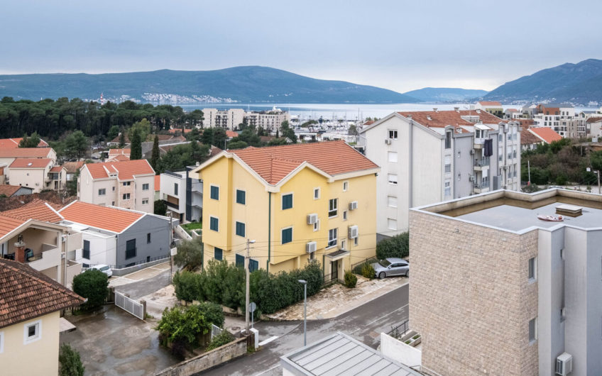 Two-bedroom apartment with panoramic sea views and a large terrace in Tivat