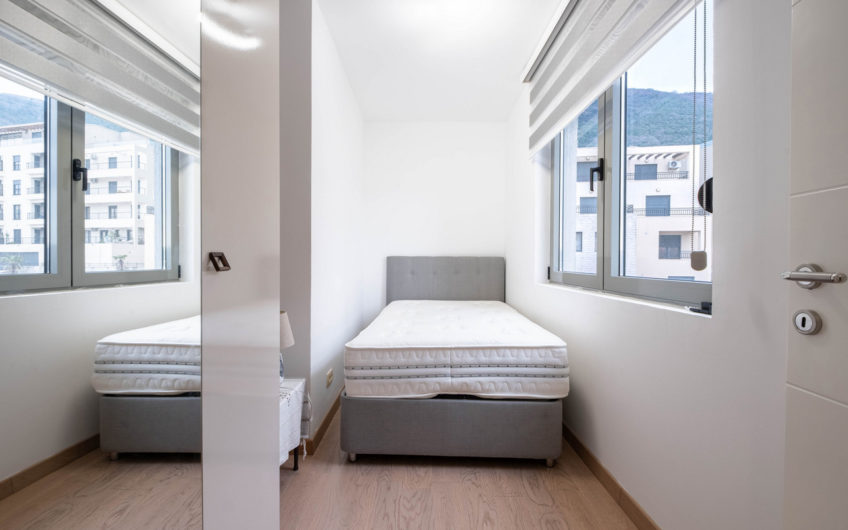 Two-bedroom apartment with panoramic sea views and a large terrace in Tivat