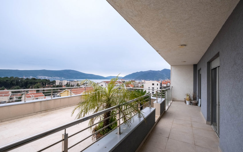Two-bedroom apartment with panoramic sea views and a large terrace in Tivat