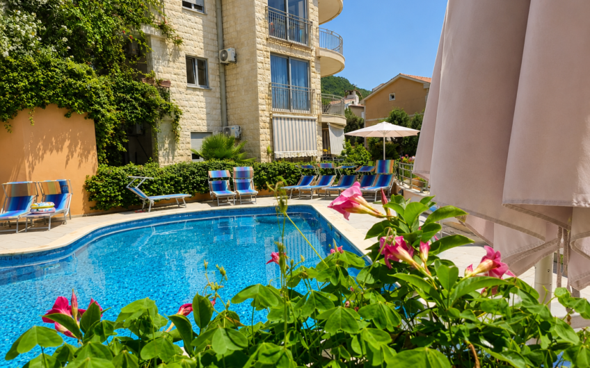 Rare Property in Petrovac: 2 Bedrooms, Sea View, Pool, and Parking — €160,000