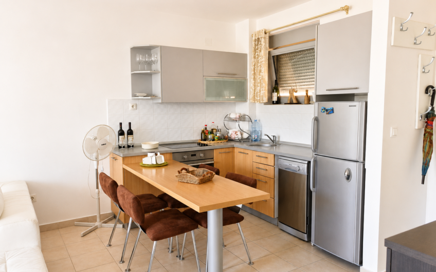 Rare Property in Petrovac: 2 Bedrooms, Sea View, Pool, and Parking — €160,000