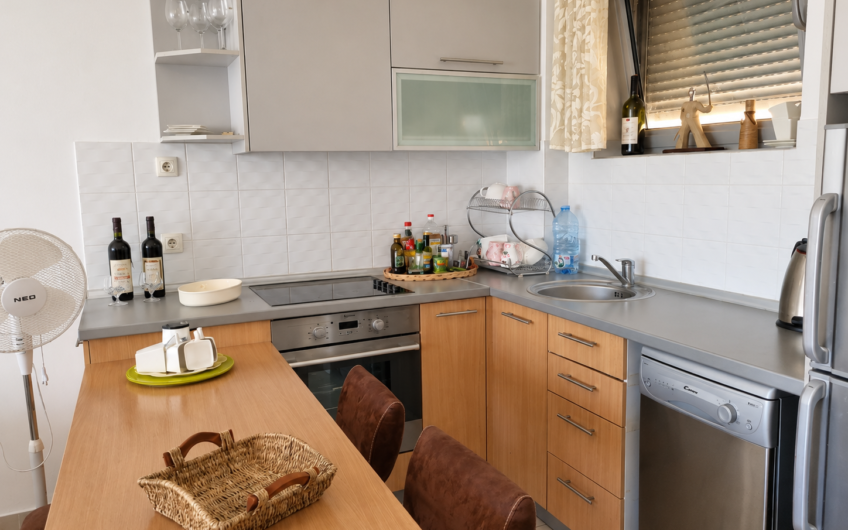 Rare Property in Petrovac: 2 Bedrooms, Sea View, Pool, and Parking — €160,000
