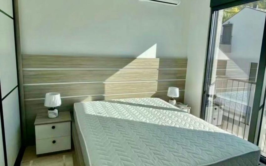 Spacious two-bedroom apartment with sea views and swimming pool