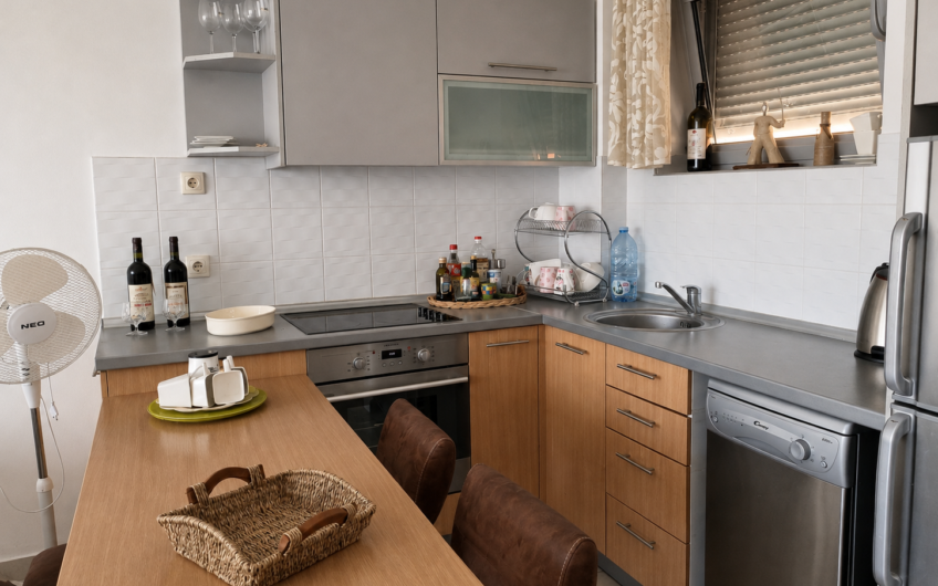 Rare Property in Petrovac: 2 Bedrooms, Sea View, Pool, and Parking — €160,000