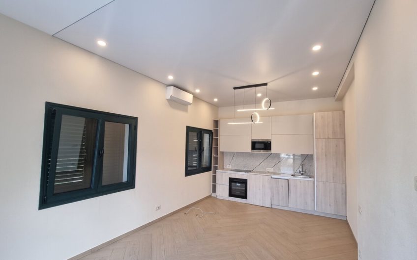 Dobrota – Two-bedroom apartment with sea view in a complex with a swimming pool